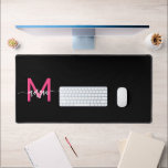 Hot Pink Black Modern Script Girly Monogram Name Desk Mat<br><div class="desc">Enhance your workspace with our Hot Pink Modern Script Girly Monogram Name Desk Mat! Featuring a bold hot pink design, this desk mat is personalized with your name in a chic modern script for a custom touch. Made from high-quality, durable materials, it provides a smooth, comfortable surface for writing and...</div>