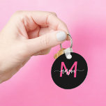 Hot Pink Black Modern Script Girly Monogram Name Keychain<br><div class="desc">Keep your keys in style with our Hot Pink Modern Script Girly Monogram Name Keychain! Featuring a vibrant hot pink design, this keychain is personalized with your name in a chic modern script for a custom, fashionable touch. Perfect for adding a bit of flair to your keys or bag, it’s...</div>