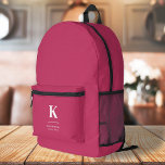 Hot Pink Feminine Girly Typographic Monogram Printed Backpack<br><div class="desc">A minimalist vertical design in an elegant style with a hot pink feature colour and large typographic initial monogram. The text can easily be customized for a design as unique as you are!</div>