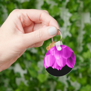 Hot pink flower petals on black keychain