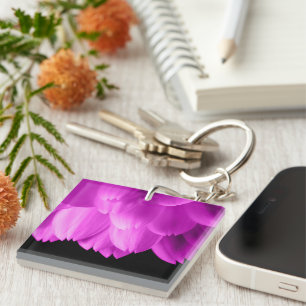 Hot pink flower petals on black keychain