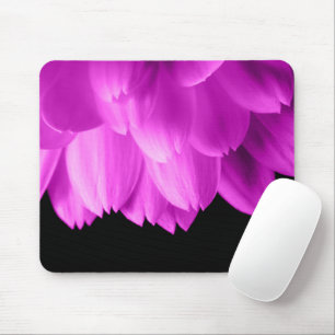 Hot pink flower petals on black mouse pad