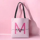 Hot Pink Modern Script Girly Monogram Name Tote Bag<br><div class="desc">Carry your essentials in style with our Hot Pink Modern Script Girly Monogram Name Tote Bag! Featuring a bold hot pink design, this tote is personalized with your name in a chic modern script for a trendy, custom look. Perfect for shopping, school, or everyday use, it offers ample space and...</div>