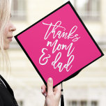 Hot Pink | Thanks Mom and Dad Graduation Cap Topper<br><div class="desc">Thank your parents for their support by wearing a custom graduation cap topper in their honour. The stylish graduation cap topper features "Thanks Mom and Dad" in a trendy modern script font against a hot pink background.</div>