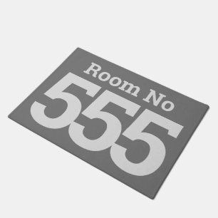Hotel Room 3 Digit Number in Bold on a  Doormat