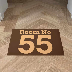 Hotel Room Number in Bold on a  Doormat