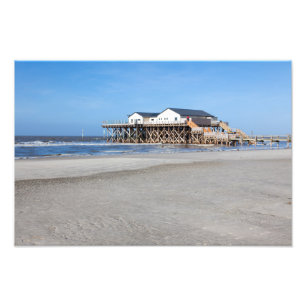 House on stilts at the beach of St. Peter Ording Photo Print