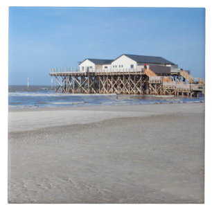 House on stilts at the beach of St. Peter Ording Tile