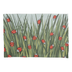Housse D'oreillers Ladybugs dans le motif vert de l'herbe