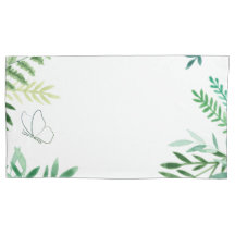 Oreillers vert et blanc