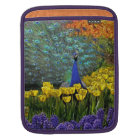 Paon dans les tulipes