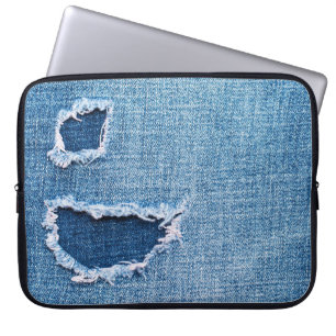 Housse Pour Ordinateur Portable Tissu en denim déchiré, teintes bleues.