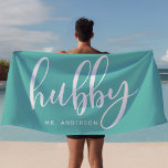 Hubby Teal And White Newlywed Groom Beach Towel<br><div class="desc">Celebrate your newlywed status with this stylish "Hubby" beach towel in teal and white, perfect for honeymoons, beach outings, or poolside relaxation. Made for grooms and newlyweds, this towel can be personalized with a last name, making it a unique gift or personal accessory. Whether by the beach or pool, it’s...</div>