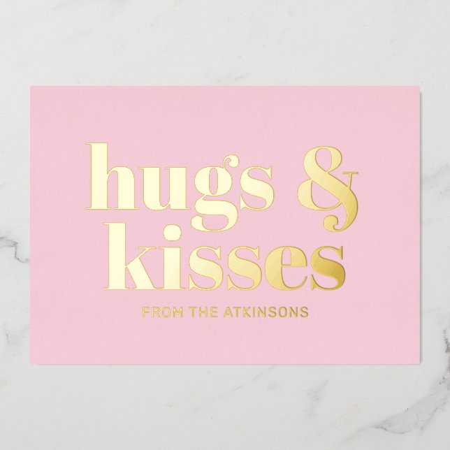 Hugs & kisses pink white modern bold typography foil holiday card (Front)