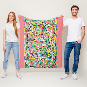 Hula hoop multi colours on salmon pink fleece blanket