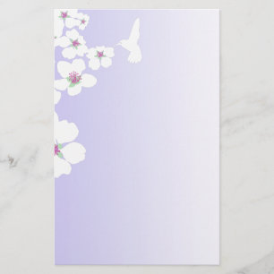 Hummingbird and blossom on purple