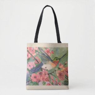 Hummingbird and blossoms tote bag