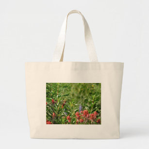 Hummingbird in wild flowers large tote bag