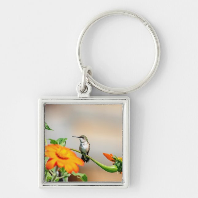 Hummingbird on a flowering plant keychain (Front)