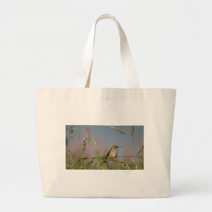 hummingbird on grass large tote bag