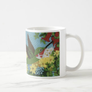Hummingbird reproduced from a hand embroidery coffee mug
