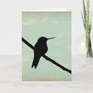 Hummingbird Silhouette on Blue Grunge Background Card