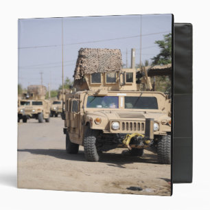 Humvee's conduct security during a patrol binder