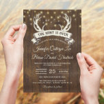 "Hunt is Over" Rustic Antler Strings Light Wedding Invitation<br><div class="desc">Rustic country-style "The Hunt is Over" wedding invitation designed against an old barn wood background with strings of sparkling light across the top of the card and a vintage deer antlers banner. Please personalize it with your own text occasion-accordingly or click the "Customize It" button to go to the design...</div>