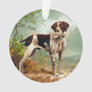 Hunter dog with bird in mouth ornament