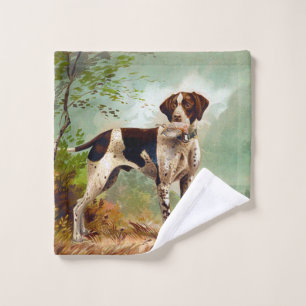 Hunter dog with bird in mouth wash cloth