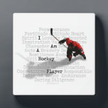 I am a Hockey Player Plaque<br><div class="desc">Mix up some perseverance,  a lot of determination,  some guts and plenty of sacrifice. Now you've got a hockey player! Another great design for hockey t-shirts and hockey gifts from</div>
