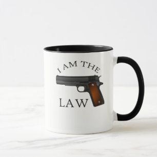 I am the law with a hand gun mug