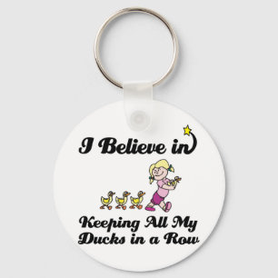 i believe in keeping all ducks in a row keychain