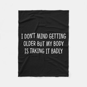 I Don't Mind Getting Older But My Body Is Taking I Fleece Blanket
