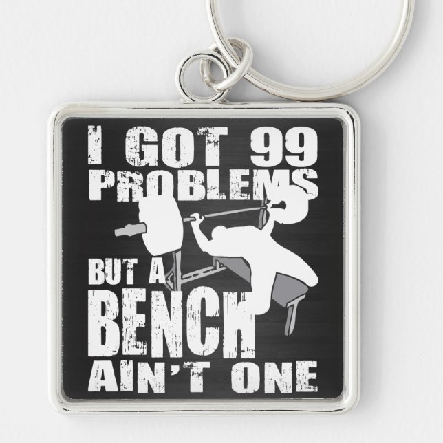 I Got 99 Problems But A Bench Ain't One Keychain (Front)