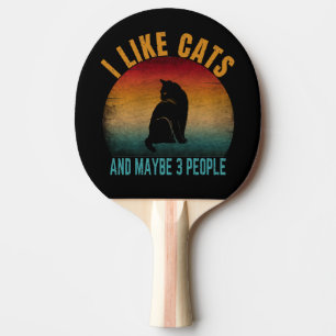 i like cats and maybe 3 people  ping pong paddle