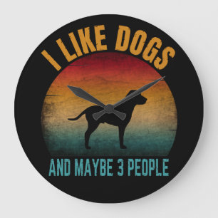 i like dogs and maybe 3 people  large clock