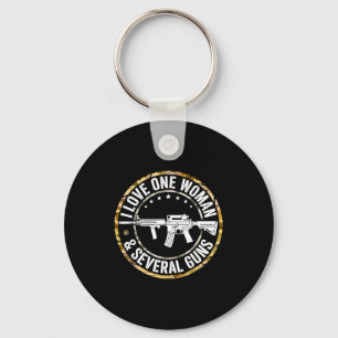 I love one woman & several guns husband funny keychain