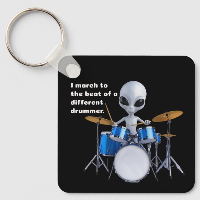 I march to the beat of a different drummer keychain (Front)