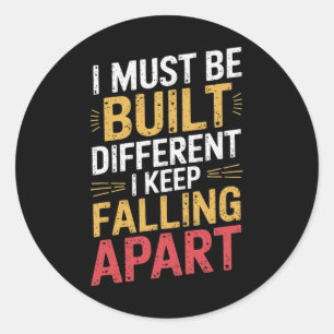 I Must Be Built Different I Keep Falling Apart  Classic Round Sticker