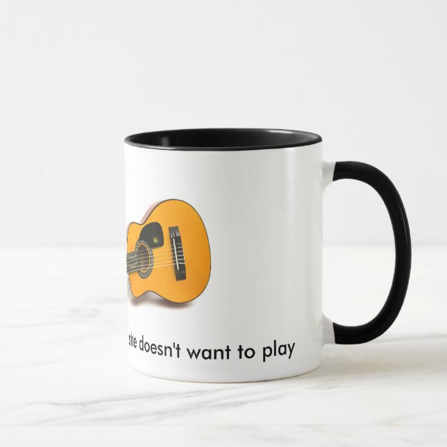 I play with my guitar when she doesn't ... mug (Right)