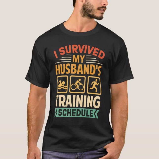 I Survived My Husband's Training Schedule Triathlo T-Shirt (Front)