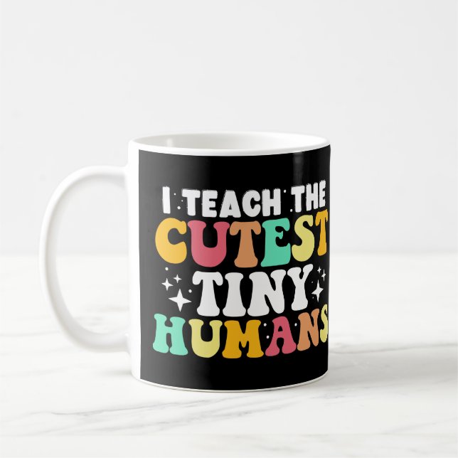I Teach The Cutest Tiny Humans Funny Teacher Coffee Mug (Left)