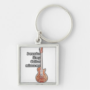 I wonder if my guitar misses me. funny quote keychain