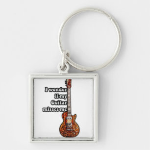 I wonder if my guitar misses me. vintage colours keychain