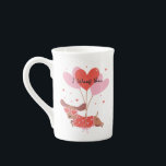 I Woof You Cute Dachshund Dog Red Heart Balloons Bone China Mug<br><div class="desc">I Woof You Cute Dachshund Dog Red Pink Heart Balloons Bone China Mug features a cute Dachshund dog wearing heart shaped glasses being carried in the air by red and pink heart shaped balloons with the text "I Woof You" in modern script typography. Accented with cute red love hearts. Perfect...</div>