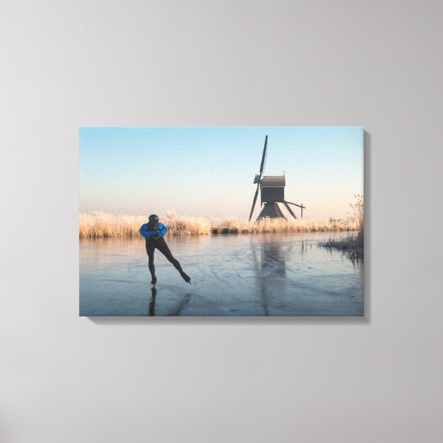 Ice skating past windmill and reeds canvas (Front)