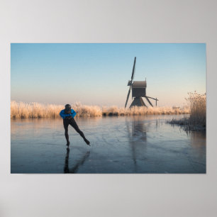 Ice skating past windmill and reeds poster