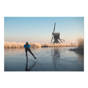 Ice skating past windmill and reeds print