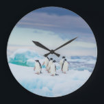 Ice & Snow | Adelie Penguins Antarctica Large Clock<br><div class="desc">This amazing Getty Images photo features a group of Adelie penguins rest on vivid blue ice in Antarctica.</div>